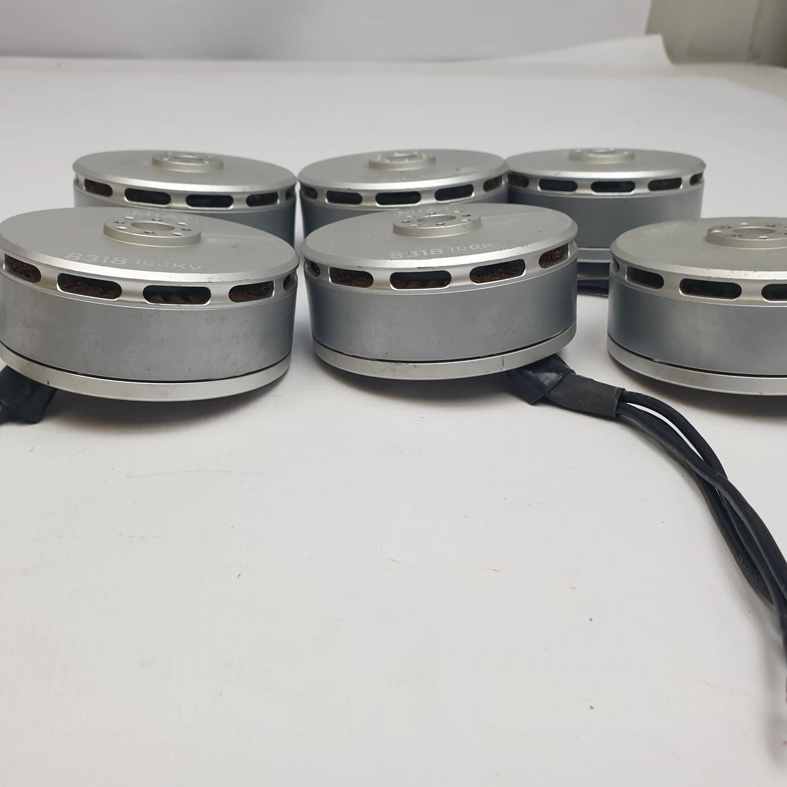 Side view of six MIAT 8318 motors showing ventilated housings