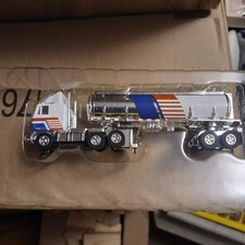 GMC Astro 95 fuel tanker from loves Heartland Express autoworld set