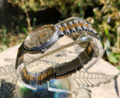 LONGINES Conquest TITANIUM メンズ　腕時計 Longines Conquest Titanium Time Zone RARE Gunmetal Dial 33mm