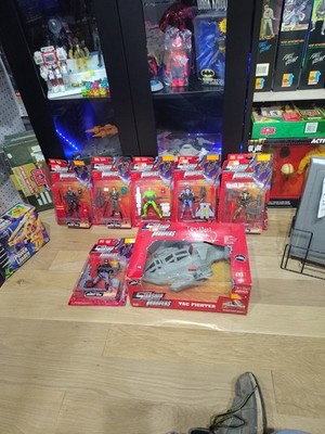 Starship Troopers Action Figurines and TAC Fighters.