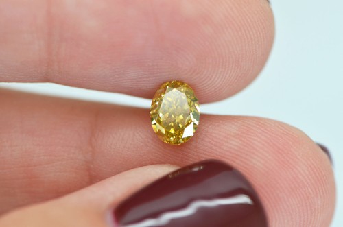Diamante suelto de forma ovalada elegante naranja amarillo 1,01 quilates certificado VS2 mejorado - Imagen 5 de 9