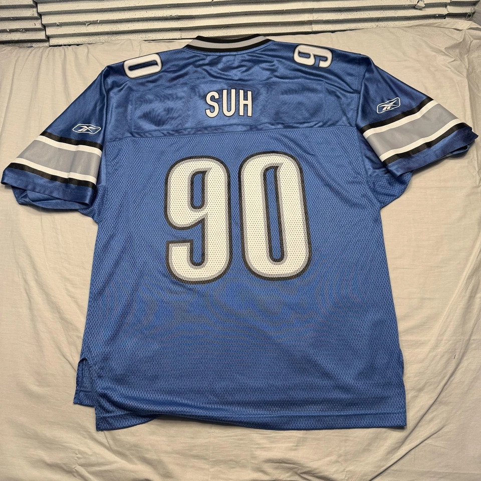 Camiseta de fútbol americano Detroit Lions para hombre azul medio NFL Ndamukong Suh Reebok No 90 Foto 2 de 4