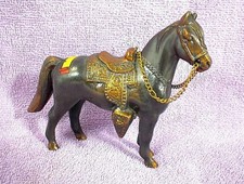 VINTAGE CAST METAL HORSE AND SADDLE FIGURINE 1948