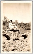 Vtg B&W Snapshot Woman Sitting Stone Arch Bridge Wall Trousers Pants April 9