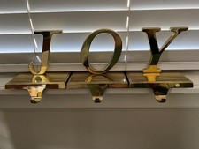 Vintage złote wieszaki na pończochy JOY (zestaw 3 - jeden na list)