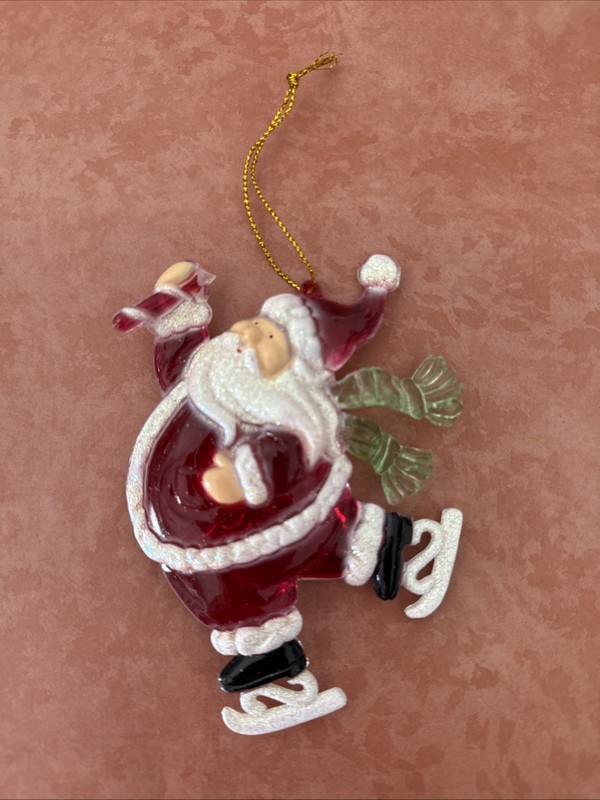 vintage clear and translucent red acrylic ice-skating Santa Claus Christmas