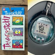 1997 BANDAI TAMAGOTCHI ORIG VTG VIRTUAL REALITY PET 1800 CLEAR BLUE / WHITE NOS