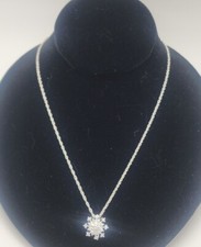 Sparkly silver tone rhinestone snowflake pendant on 18" necklace