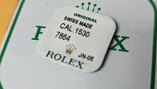 Rolex Balance Staff 1530 7864 SEALED/NEW with 3 inside. collet fitting 0.53mm