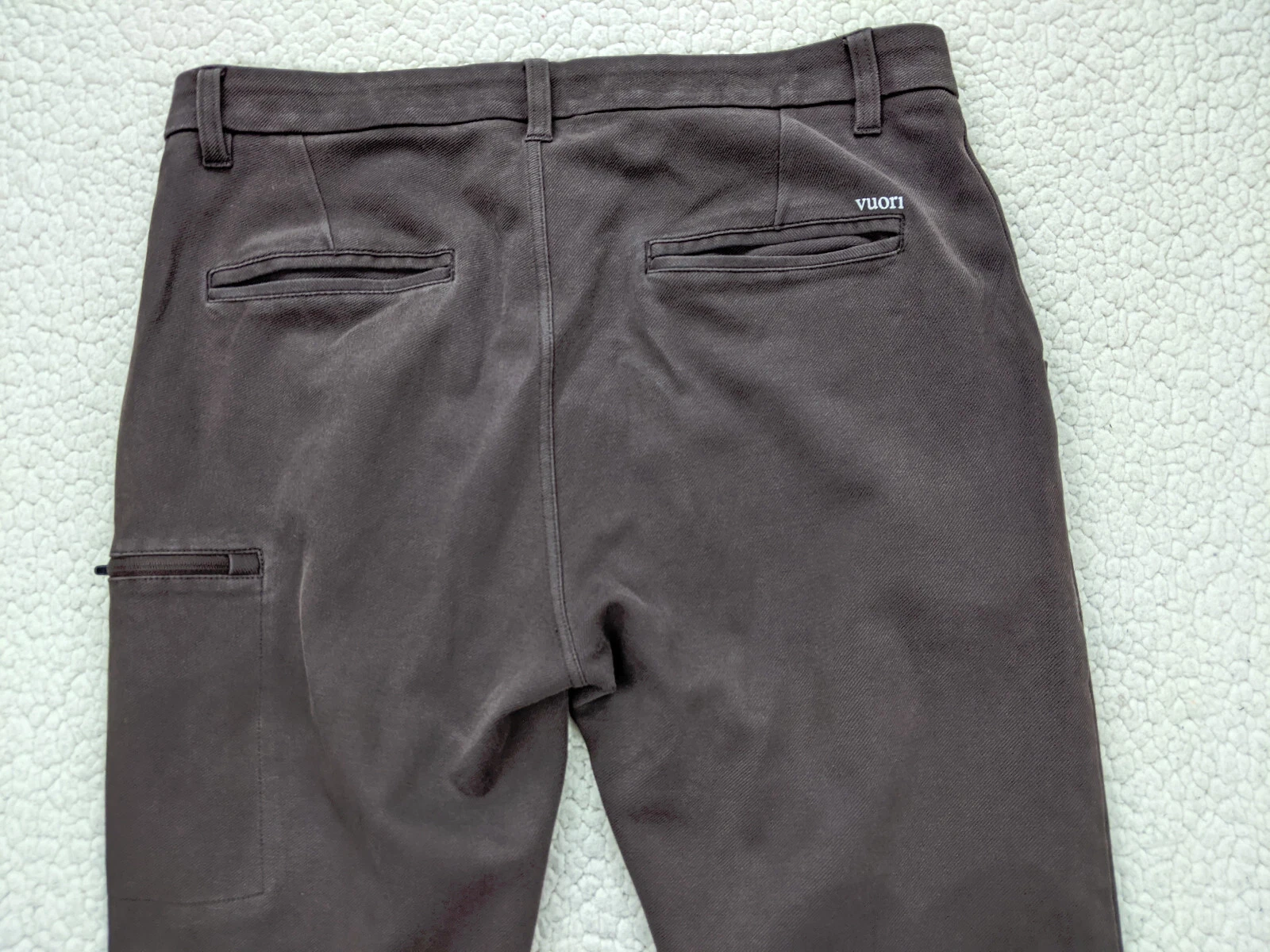 vuori flex mid rise dark wash zip pocket pants