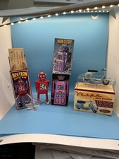 Lot of wind up TIN TOY ROBOTS W/ BOXS and a Die Cast VESPA