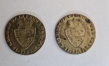 A pair of George 111 brass imitation half guinea gaming tokens. 1768