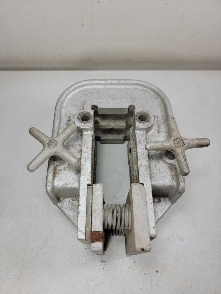 A beautifully machined vintage aluminum self-centering doweling jig — the kind of precise, satisfying hand tool that modern mass-market sets can't replicate.