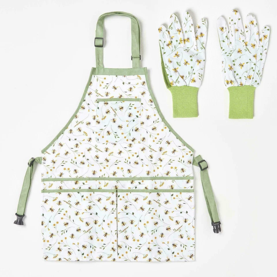 Grün-weiße Gartenhandschuhe und Schürze mit Taschen im Bienenblumendesign - Bild 1 von 1