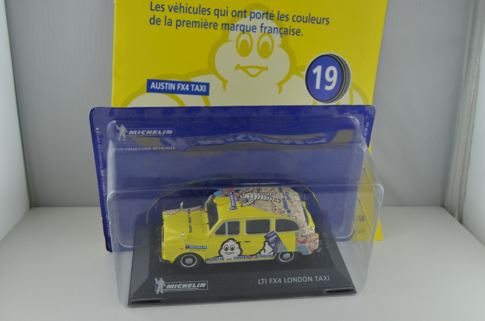 Taxi Austin FX4 Michelin N°19 réplique de prestige en métal 1/43