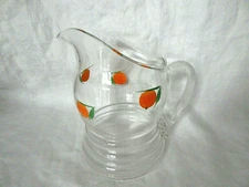 VTG CLEAR GLASS WIDE BASE JUICE PITCHER WITH PAINTED ORANGES RIBBED HANDLE