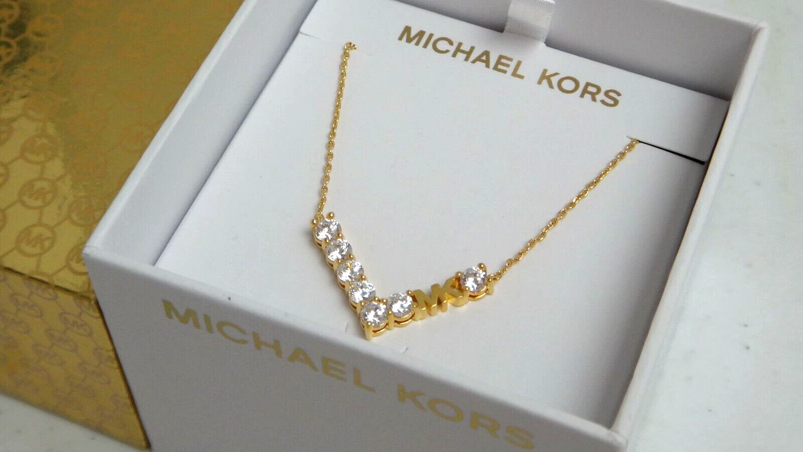 Collana Michael Kors oro giallo logo MK 7 cristalli singoli MKJ7313710 + SCATOLA MK