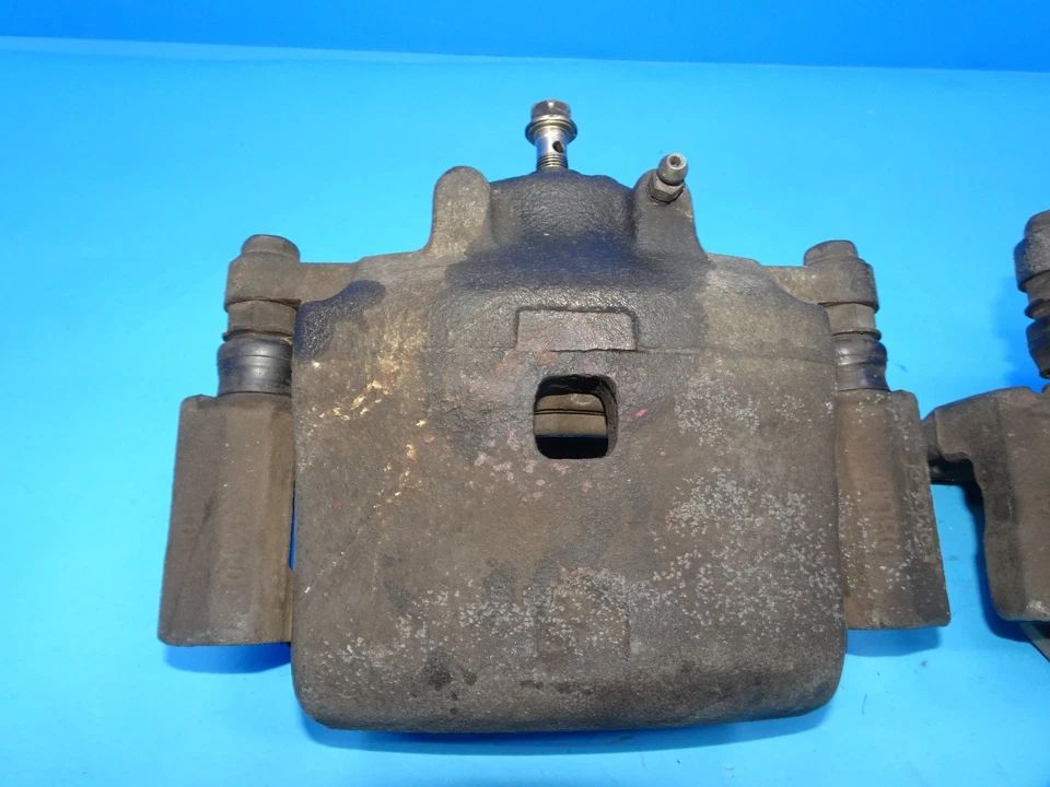 06-12 Pinzas de freno delanteras izquierda y derecha Ford Fusion Mercury Millan MKZ Mazda OEM Foto 3 de 4