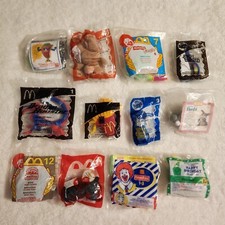 Mixed Lot of 12 Mostly Vintage McDonald  s Happy Meal Toys New Sealed Condition