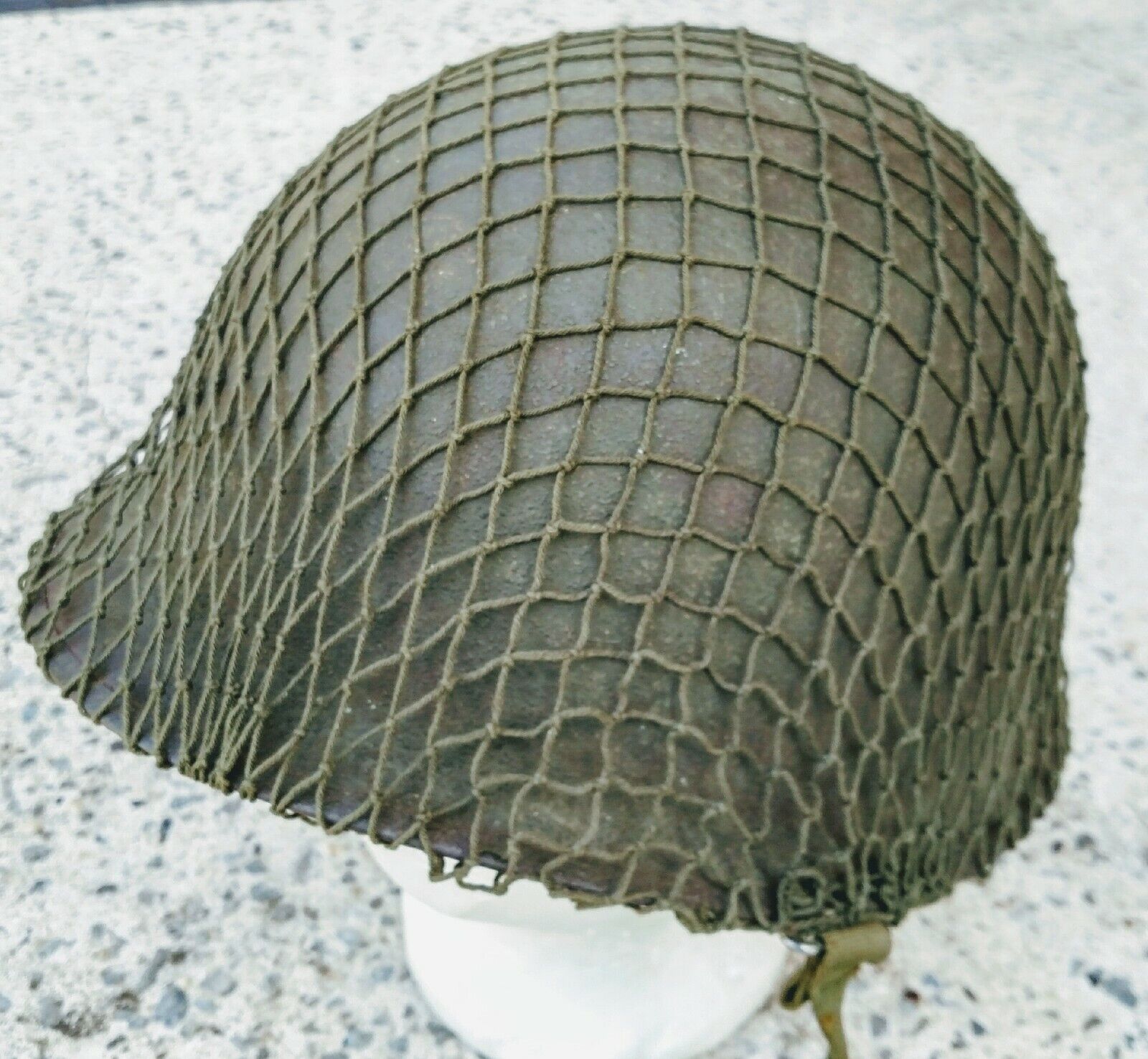 US WWII “ETO” Manufactured M-1 helmet Camo Netting