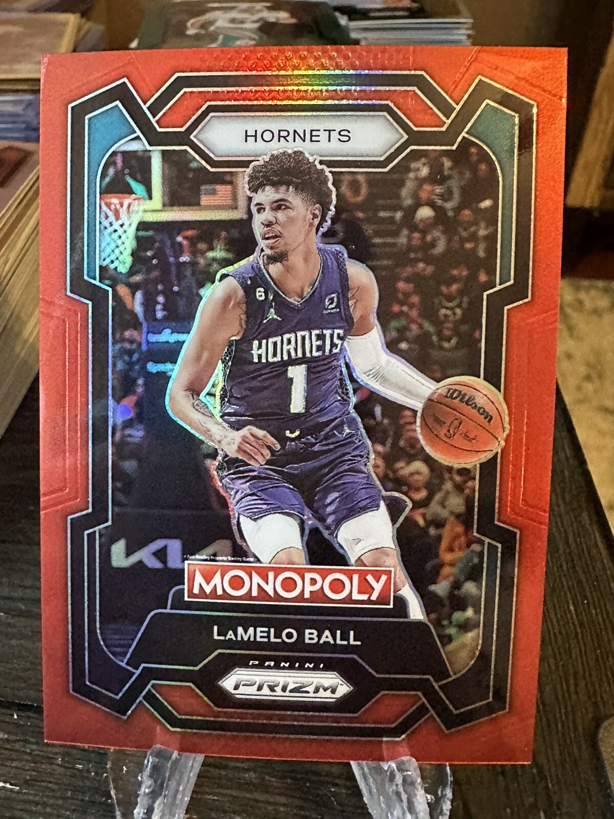 LaMelo Ball 2023-24 Prizm Monopoly /99 Red SP Hornets #13