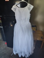 A White Prom Or Graduation Dress Long With Short Sleeve