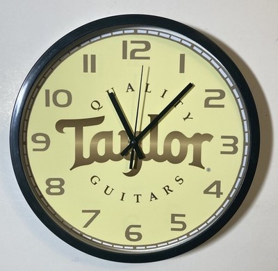 Taylor Guitars Logo Battery Operated Wall Clock