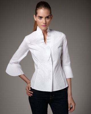 black blouse with white collar and cuffs