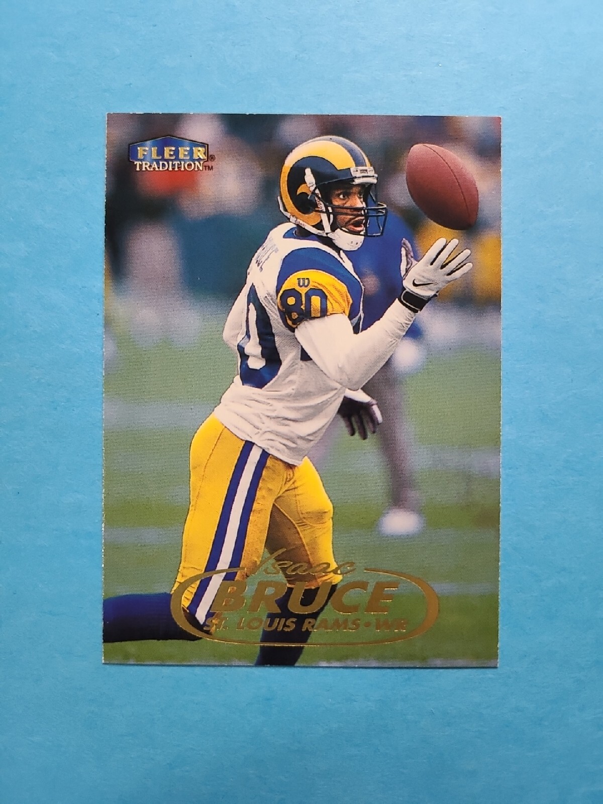 ISAAC BRUCE 1998 FLEER TRADITION FOOTBALL CARD # 21 G5316