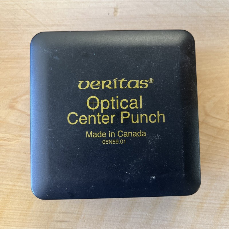 Veritas Optical Center Punch