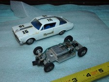 1/32 Strombecker Plymouth Barracuda slot car 2 X chassis
