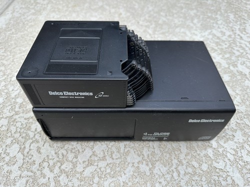 GM CADILLAC CORVETTE DELCO 12 DISC CD CHANGER & MAGAZINE 25685332