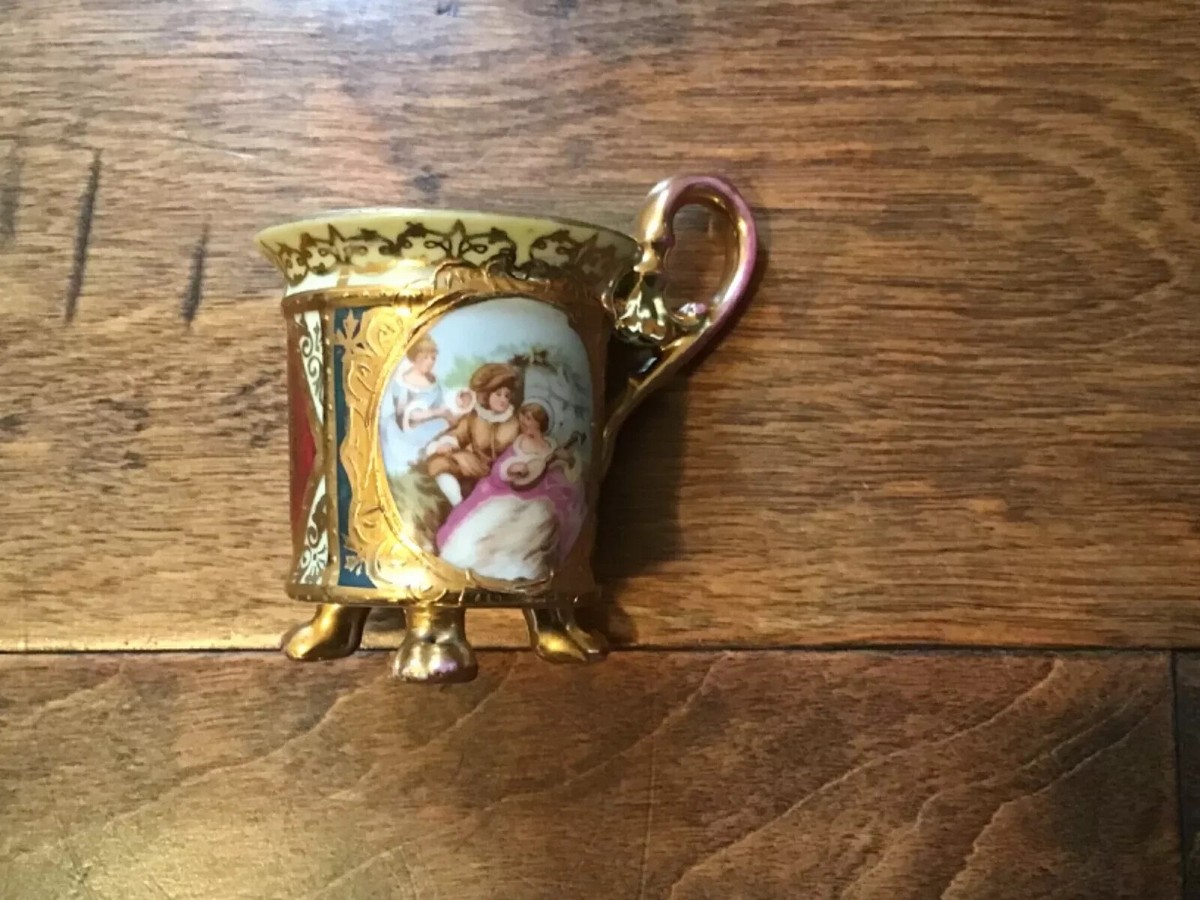 ANTIQUE ROYAL VIENNA AUSTRIA PORCELAIN FOOTED CUP AND SAUCER