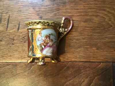 ANTIQUE ROYAL VIENNA AUSTRIA PORCELAIN FOOTED CUP AND SAUCER