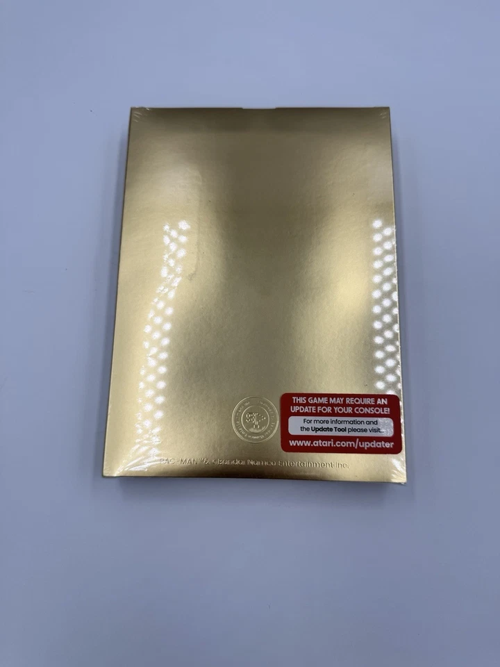 SDCC 2025 EXCLUSIVE ATARI GOLD EDITION PAC-MAN PINK CARTRIDGE VARIANT LE 1000 NM - Image 2 of 4