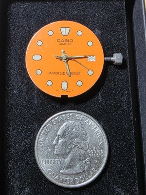 Vtg Casio 50m resist Lume Watch Dial with movement parts only  26.41mm  (D6)