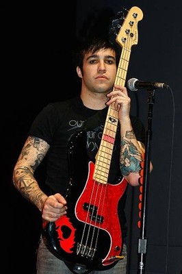 Pete Wentz of the musical group Fall Out Boy performs during their- Old Photo