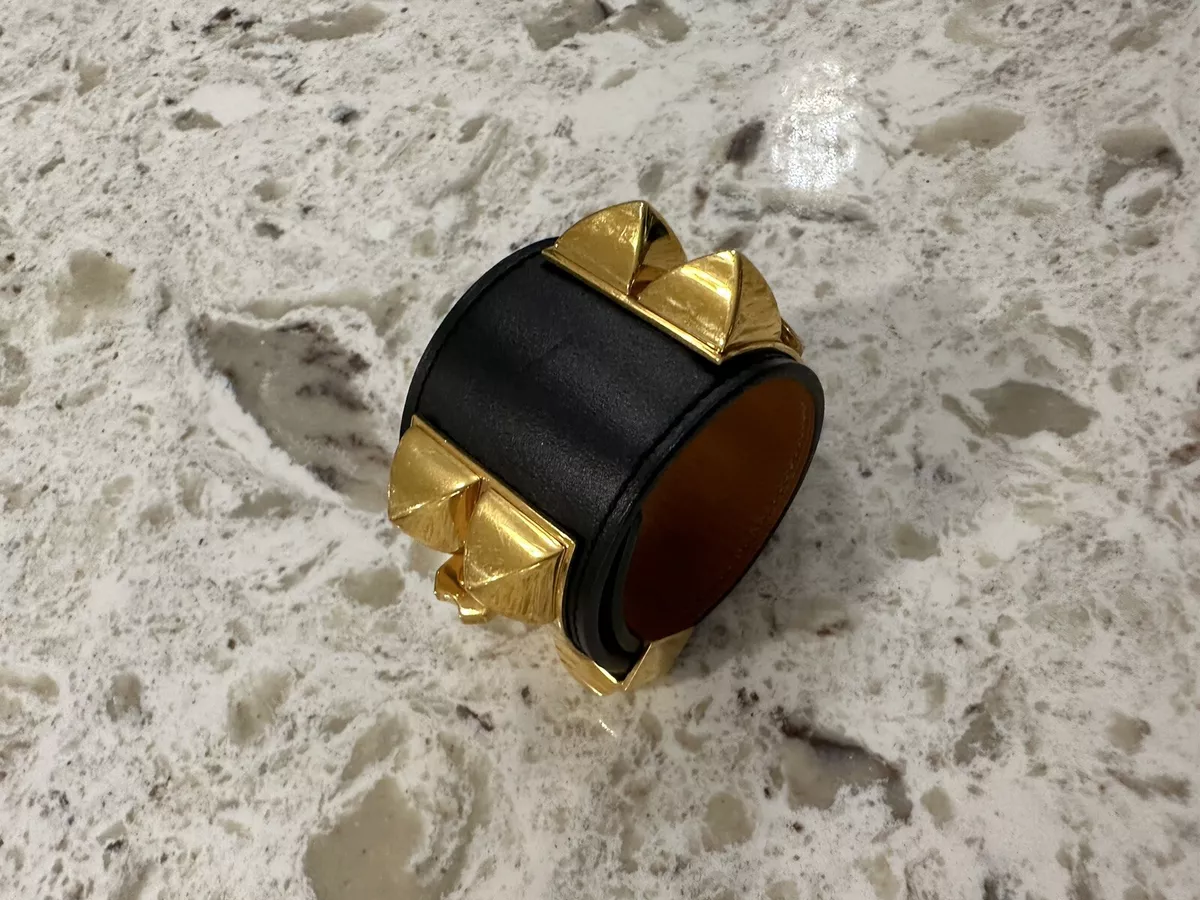 Hermes black and gold hotsell bracelet