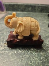 Vintage Celluloid Elephant On Wooden Stand Trunk Up