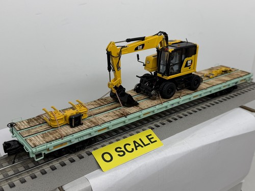 MTH O escala 3 rieles con una excavadora de riel alto caterpillar m323f en CORTA 915731 | Condition: New