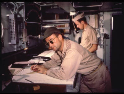 Navigating Officer Cdr Hylan B Lyon work chart house during shaked- Old Photo