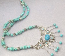 Bohemian-style turquoise and alloy beaded necklace with a statement pendant 20in