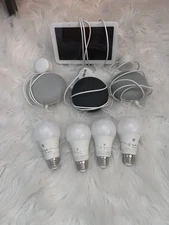 Google Nest Hub (2nd Gen.), 3 Google Mini Speakers, and 4 Cync Smart Lights