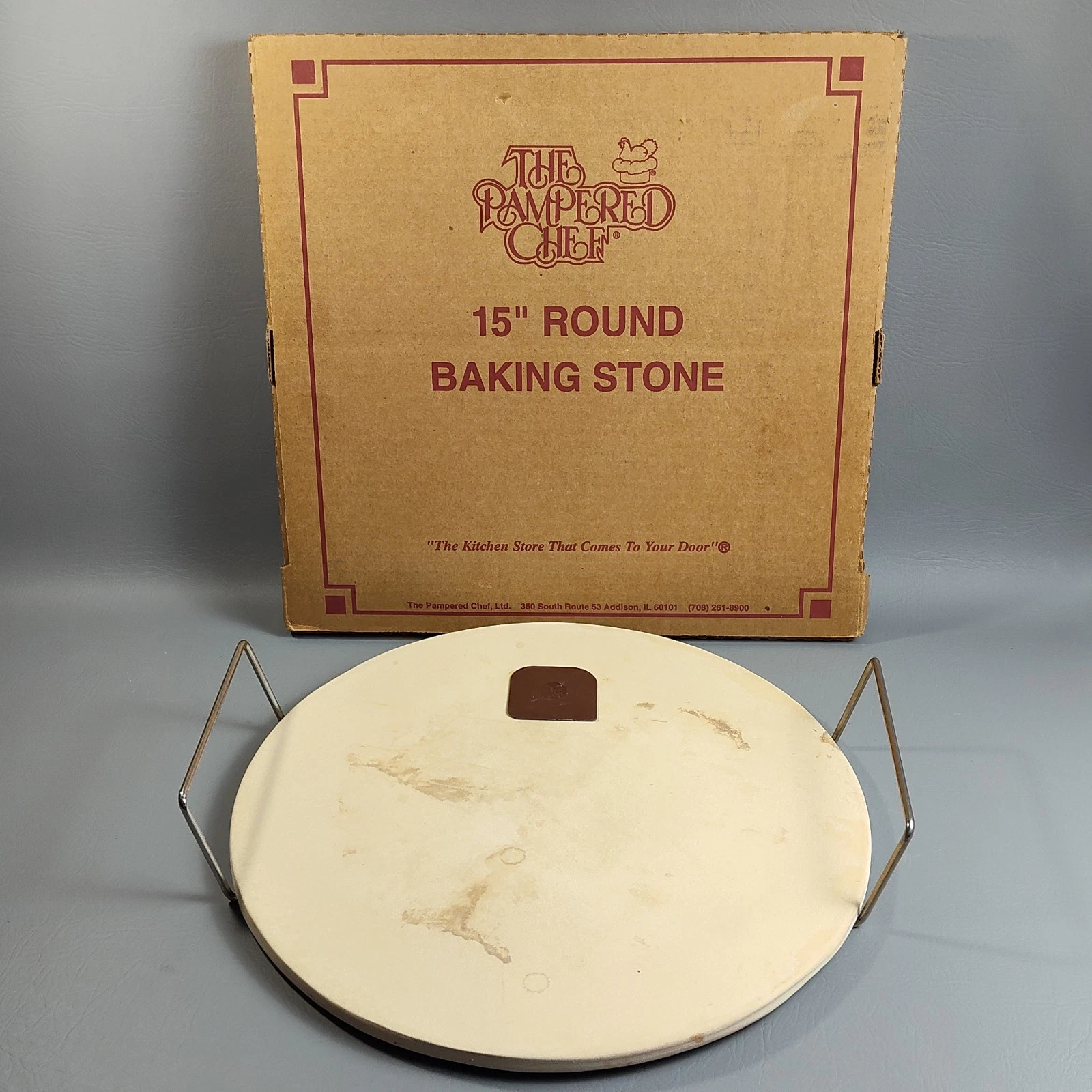 PAMPERED CHEF 15" Diameter Round Baking Pizza Stone W/ Carrying Rack & Scraper
Opens in a new window