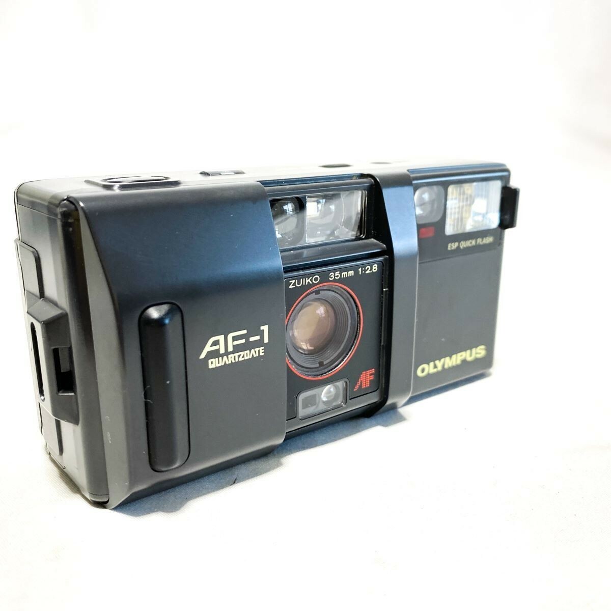 OLYMPUS AF-1 QUARTZ DATE ZUIKO 35mm F2. Film Camera Body only from