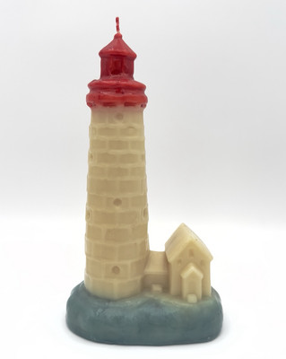 VINTAGE TALL LIGHTHOUSE SCULPTURE CANDLE RED, WHITE, BLUE. UNUSED.