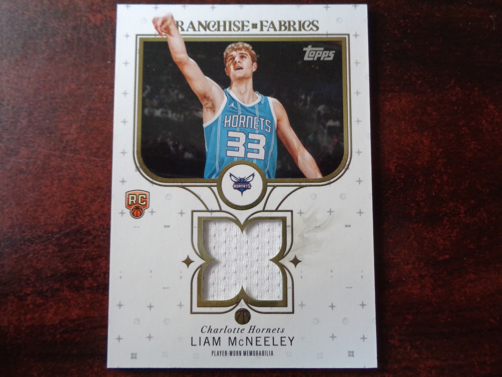 2025-26 Topps Liam McNeeley Franchise Fabrics JERSEY Relic RC-Hornets