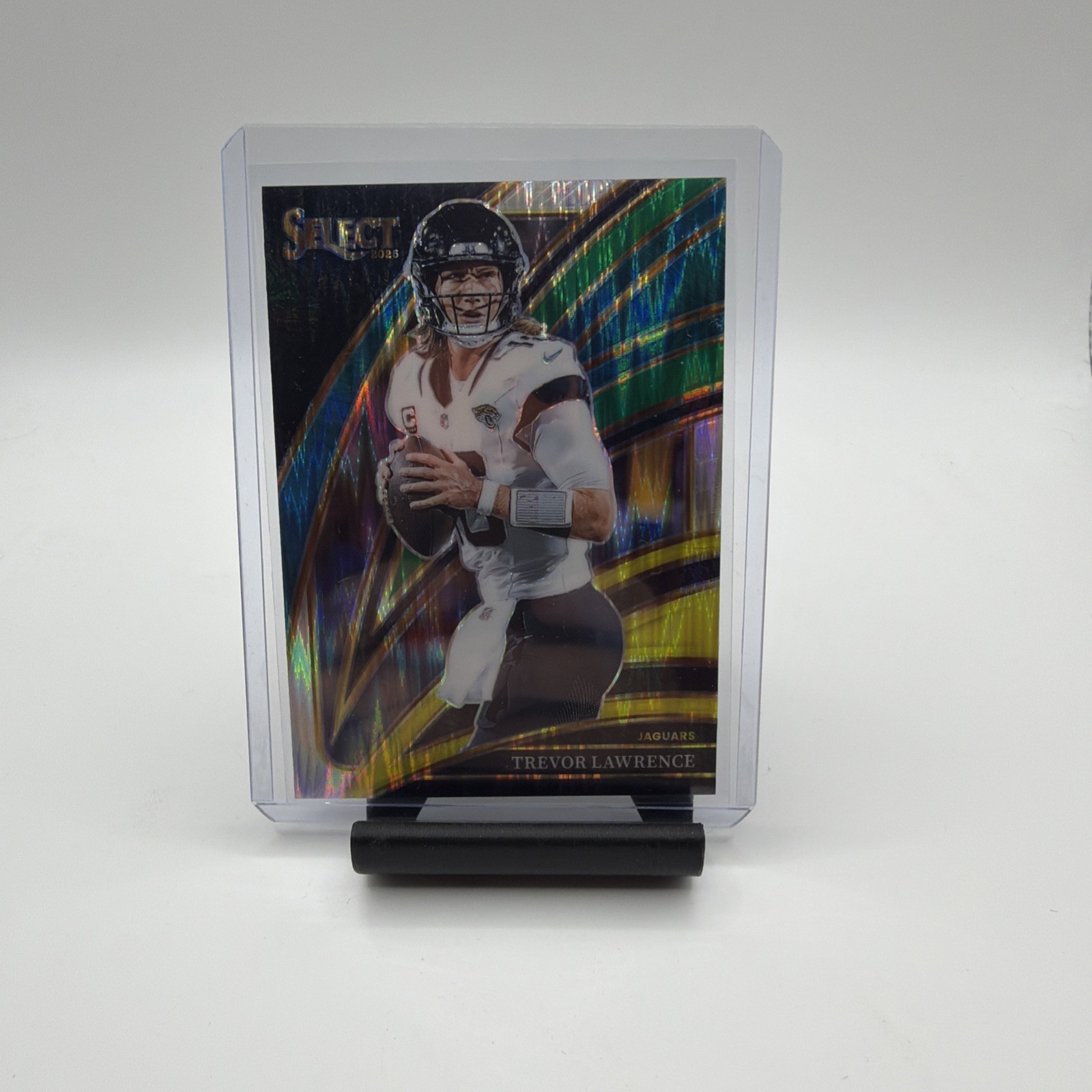 2025 Panini Select Trevor Lawrence Club Level Green & yellow Prizm Shock Jaguars
