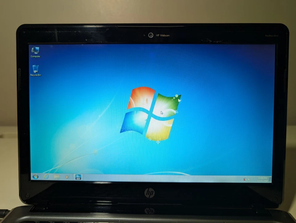 Windows 7 HP Pavilion dm3 | Athlon Neo X2 | 4GB RAM | 320GB HDD | Cargador HP Foto 2 de 4