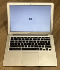 Apple MacBook Air A1369 13-Inch, Mid 2011. Powers On. For parts Or Repairs .